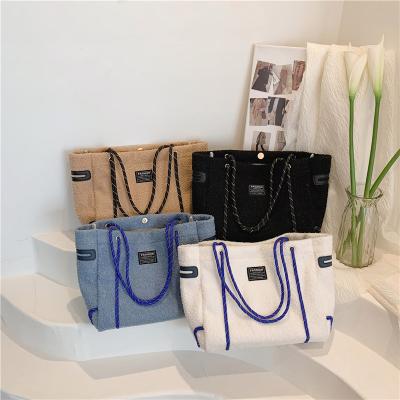 China New Letter Large Capacity Designer Plush Luxury Bag Women's Winter Simple Casual Shoulder Bag Tote Bags for sale