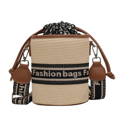 China Fashion Woven Handbags Women Clutch Evening Clutch Bag Cylinder Drawstring Shoulder Bag New Handbags Pinch for sale