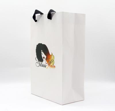 China Wholesale Customized Recyclable Luxury Logo Design Paper Bag Gift Packaging Bag With Ribbon Handle for sale