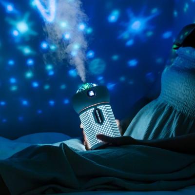 China Car 600ML Mini Usb Humidifiers Light And Mist Romantic Encounters Airing Projector Ultrasonic Humidifier for sale