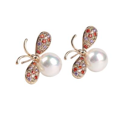 China FASHIONABLE Wholesale FASHIONABLE Stud Earrings Women Butterfly Gold Earring Pearl FACEINS Asymmetrical Earring Stud Earring for sale