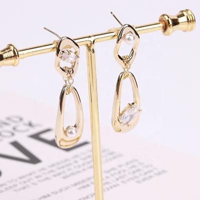 China FASHIONABLE Asymmetrical Pearl Earrings Zircon Women Earring Gold FACEINS Dangling Earrings Drop Ear Ring Jewelry for sale