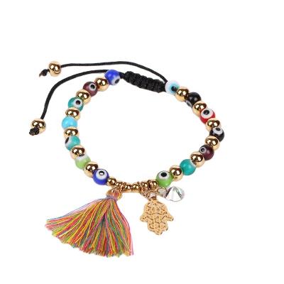 China Handmade CLASSIC FACEINS Tassel Bracelets Women Gold Eye Bead Bracelet Stainless Steel Pendant Bead Bracelet for sale