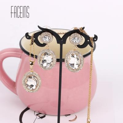 China CLASSIC FACEINS Exaggerated Rhinestone Earrings Necklace Set Women Oval Trendy Jewelry Set Gold Dubai Wedding Jewelry Set for sale