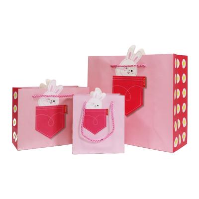 China Wholesale Recyclable Kraft Paper Bag Pink Cute Cartoon Paper Bag With Three Strand Rope for sale