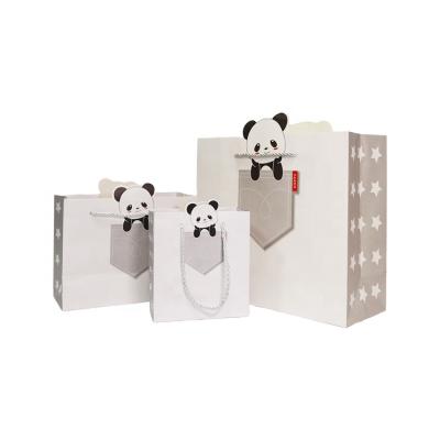 China White Cute Recyclable Stain Paper Sack Cartoon Paper Packaging Bag With Three Rope Strands for sale