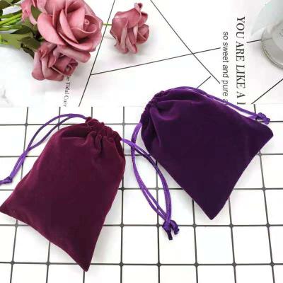 China Gift Jewelry Velvet Pouch Tassel Drawstring Velvet Bags Pouch Makeup Sweeps Jewelry Gift Packaging Bag for sale