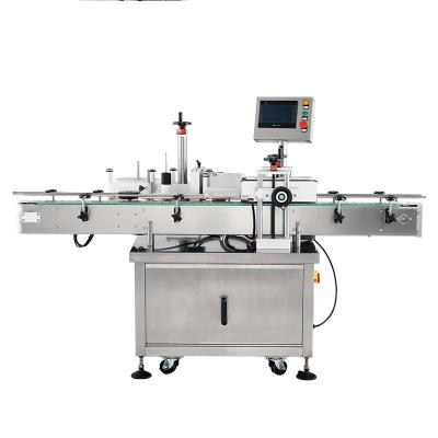 China Automatic Food PET Placing Labeling Machine Self Adhesive Automatic Packaging Machine Bottled Labeling Machine Boxed Commodities for sale