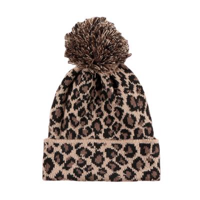 China COMMON 100% Acrylic Leopard Print Knitted Beanie Hat Winter With Ball European And American Yarn Style for sale