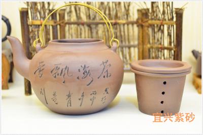 Cina Handmade Chinese Yixing Zisha Teapot 1000ml With Chinese Words Carving in vendita