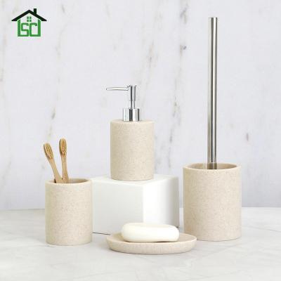 China 2022 Viable New Style Carving Resin Toothpaste Dispenser 4pcs Bathroom Accessories Set for sale