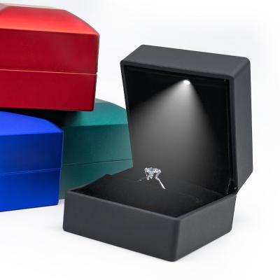 China Fashionable Custom black plastic jewellery led light ring packaging jewelry boxes with logo luxury wholesale for women for sale