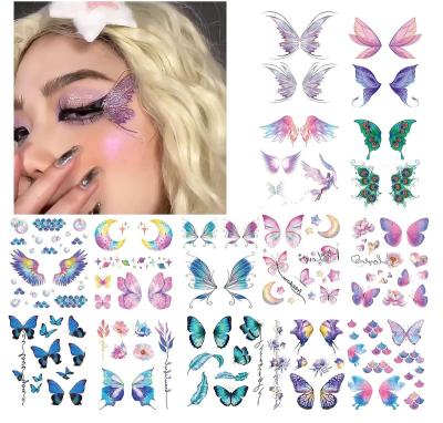 China Temporary Ins Hot butterfly makeup temporary tattoo stickers Colorful butterfly angel wings flower mermaid face eye body tattoo for sale