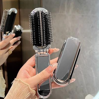 China Travel Hair Styling Tools Travel Hair Brush With Mirror Folding Hair Brush Collapsable Mini Travel Pocket Brush Massage Comb for sale