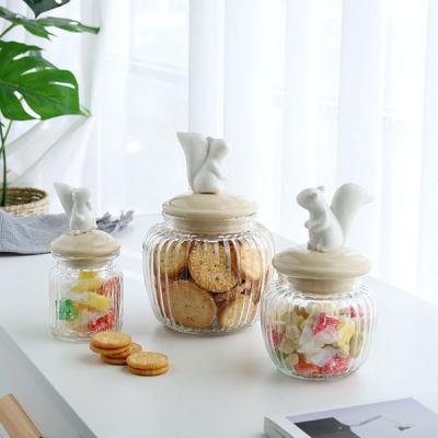 China OEM Traditional Wholesale High Quality Set Of 3 Squirrel Lid Clear Candy Glass Jar For Kitchen Use for sale