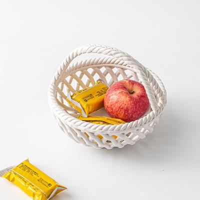 China New Stocked Decorative Flower Shape White Ceramic Fruit Basket With Handle for sale