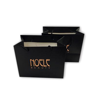 China Clothing Shopping High Quality Customized Paper Packaging Bag For Shopping Retail for sale