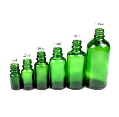 China Personal Care 5ml 10ml 15ml 20ml 30ml 50ml 100ml Empty Green Glass Cosmetic Bottles Wholesale for sale