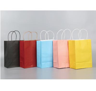 China Bio-degradable Reusable paper bags custom shopping merchandise paper bag with twisted handle for sale