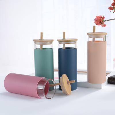 China Viable Hot Selling Silicone Sleeve Bamboo Glass Water Bottle Lid Glass Tumbler With Bamboo Straw for sale