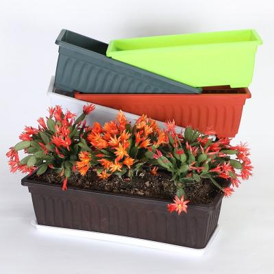 China Modern Rectangular Resin Flower Pots Self Watering Plant Rectangular Plastic Pot With Tray Flower Pots And Planters Watering Selft Rect for sale