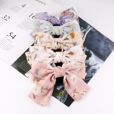 China Wholesale Fashionable Popular New Style Spring Clip Knot Beautiful Stain Hair Hair Clips Bow Accessories Women's Hair Clips for sale