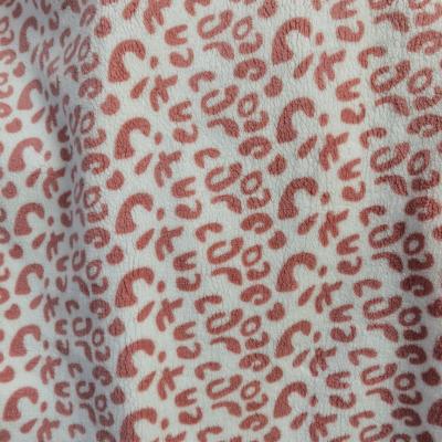 China Two Sides Heat-Insulation 100 Polyester Stock Printed Lamb Velvet Fabric In Shed for sale