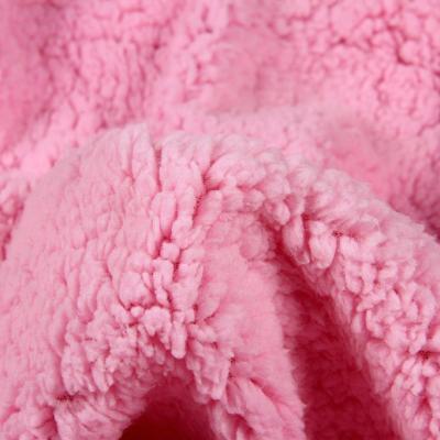 China Good quality action Hot-wholesale flame retardant Coral Flannel Fabric plain on both sides in discount for sale