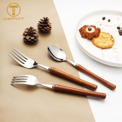 China Stocked Extra Heavy Wooden Handle Cutlery Set 304 Stainless Steel Flatware For Wedding for sale