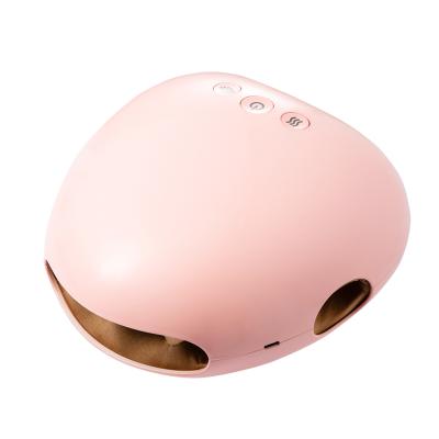 China Small And Convenient Design Cordless Warm Heating Comfortable Portable Pink Hand Massager for sale