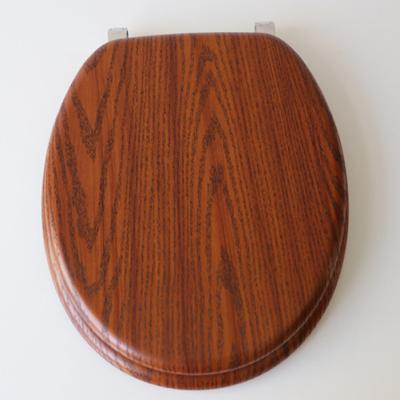 China Slow-end Toilet Seats 18' Position Molded Wood Toilet Seat Cover With PVC Sheet Wood Grain for sale