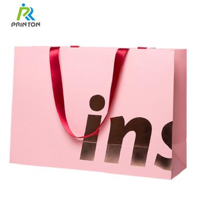 China Customized wholesale handmade logo rose luxury shopping paper bag with ribbon handle for sale