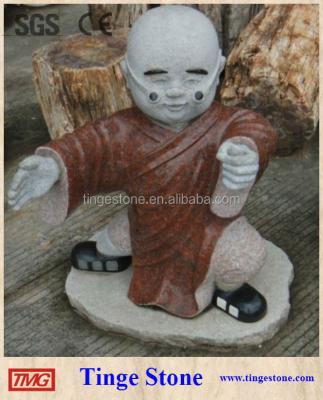 China Natural Temple Monk Statues With Red Granite Clothes Carved Sculptures for sale