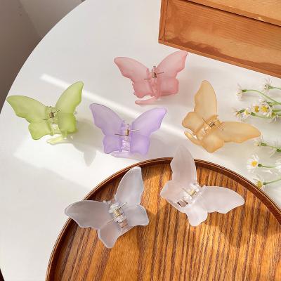 China Wholesale New Butterfly Korean Soft Daily Decorative Hair Claws Luminous Transparent Plastic Hair Claw Clips For Women for sale