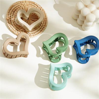 China Custom Hair Daily Wear Fashion Candy Colors Heart Hair Claws Matte Cute Hair Claw Plastic Clips For Thick Hair for sale