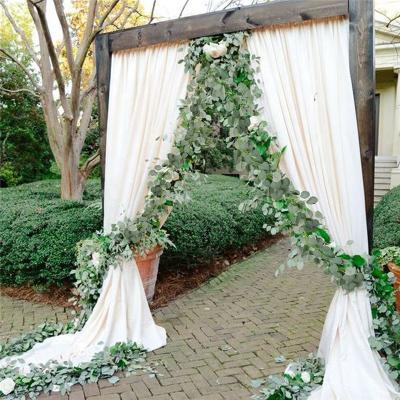 China Eucalyptus Arch Backdrop Faux Silk Home Decoration Garland Wall Decor Greenery Wedding Artificial Vines for sale