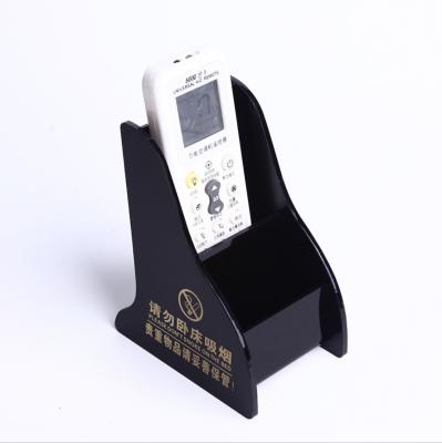 China Eco-friendly remote control air conditioner custom desktop remote control box home storage box hotel room hotel room printing logo for sale