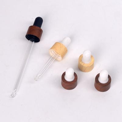 China 18410 Pilfer Proof Black Wood Plastic Dropper Cap 18mm Pipette With Water Transfer Wood Grain Plastic Wood Cap for sale