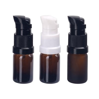 China Personal Care 5ml Glass Bottle Boston Amber Round Empty Brown Glass Bottle With 18/415 Plastic Spout Cream Pump for sale