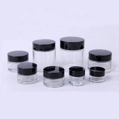 China Clear Glass Jars 20ml 30ml 50ml Black Lid Cosmetic Cream Jars 5g 10g 20g 30g 50g Cosmetic Clear Glass Jar With Black Lid for sale