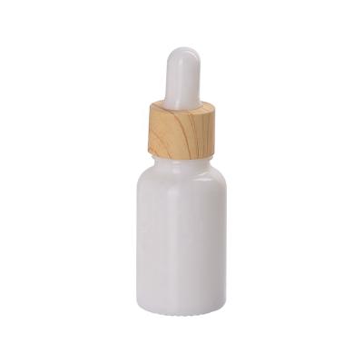 China Personal Care 15ml Wooden Dropper Bottle White Opal Glass Bottle With Water Transfer Printed Light Grain Wood Plastic Cap For Essential Oil for sale