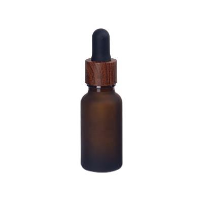 China Personal Care Water Transfer Wooden Dropper 20ml Frosted Brown Glass Dropper Bottle 20ml Frosted Amber Cosmetic Bottle For Essential Oil for sale