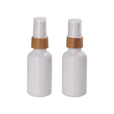 China Personal Care 1 Ounce Fine Mist Glass Spray Bottle Opal White Empty Cosmetic Packaging 30ml Glass Bottle With 18mm Bamboo Spray For Essence for sale