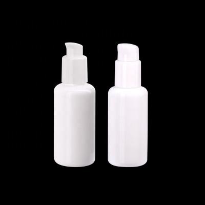 China 40ml cosmetic opal white glass bottles with 20/410 white plastic body milk lotion pump bottle for sale