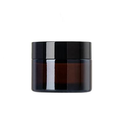 China 50ml Empty Brown Glass Jars 50g Cosmetic Amber Glass Cosmetic Cream Jars With Black Lid for sale