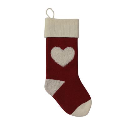 China Acrylic Christmas Decorations Hang Act The Role Of Red Knitted Candy Bag Yarn Gift Bag Looped 3 D Love Christmas Stockings for sale