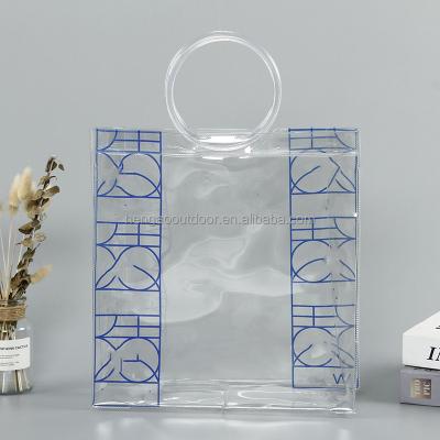 China Clear PVC Beach Bag High Quality Large Custom Clear Makeup Bag Clear Tote Shopping Bag With Ring Handle for sale