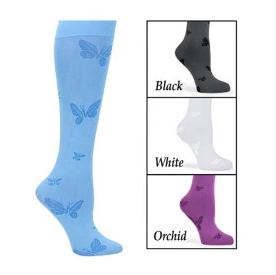 China QUICK DRY wholesale custom made women's socks butterfly nylon short socks knee high sublimation logo socks ladies en venta