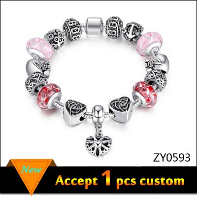 China ALLOY new design antique silver charm bead bracelet, European pink glass charm bead bracelet for sale