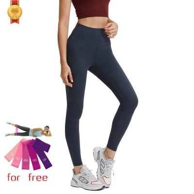 China ZH018 Breathable Shape New Style Ladies High Waisted Tight Sports Workout Yoga Pants With Pockets Tik Tok Fitness Leggings For Women for sale